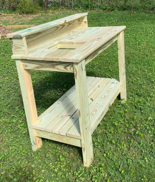 Potting table built with long lasting pressure treated lumber.